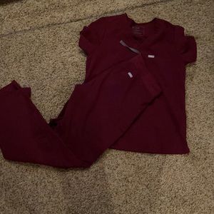 Maroon Figs. Practically brand new size M tall.